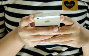 Person using phone.