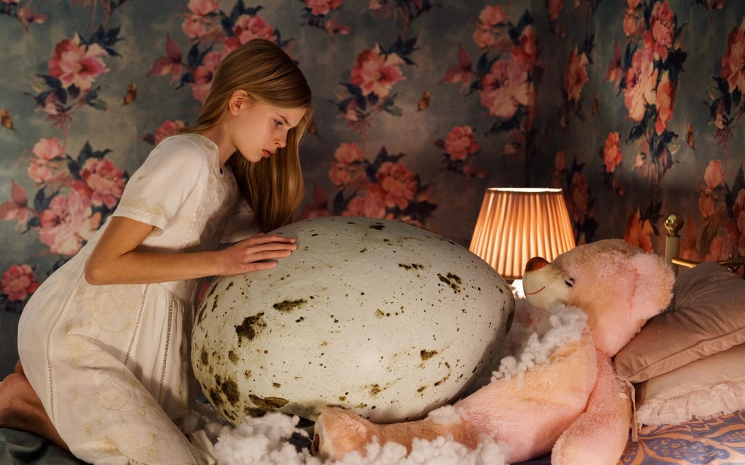 A still from the 2022 Finnish horror film Hatching
