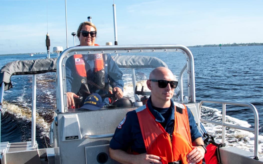 Coast Guard Petty Officer 2nd Class Haven Gill, a boatswain’s mate with the Gulf Strike Team, pilots a 20-foot Coast Guard boat, during a mission to assess potential pollution targets from Hurricane Ian, as part of the Hurricane Ian ESF-10 Unified Command pollution response.