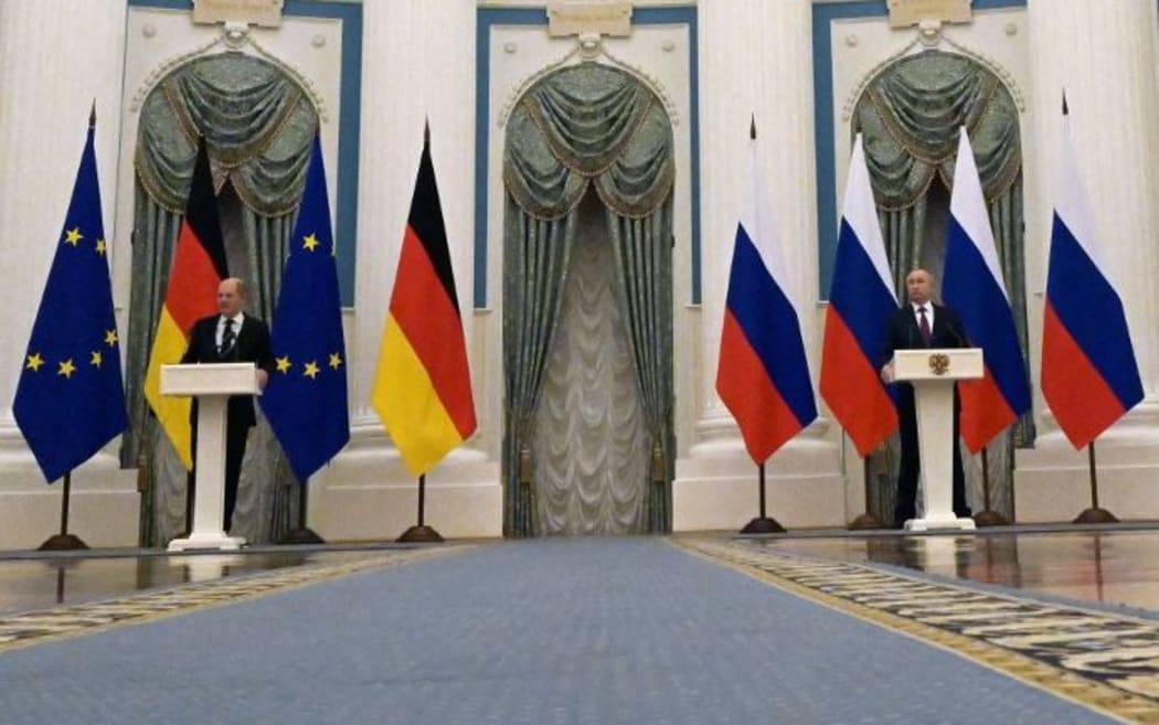 Russian President Vladimir Putin (R) and German Chancellor Olaf Scholz give a joint press conference following their meeting over Ukraine security at the Kremlin, in Moscow, on February 15, 2022.