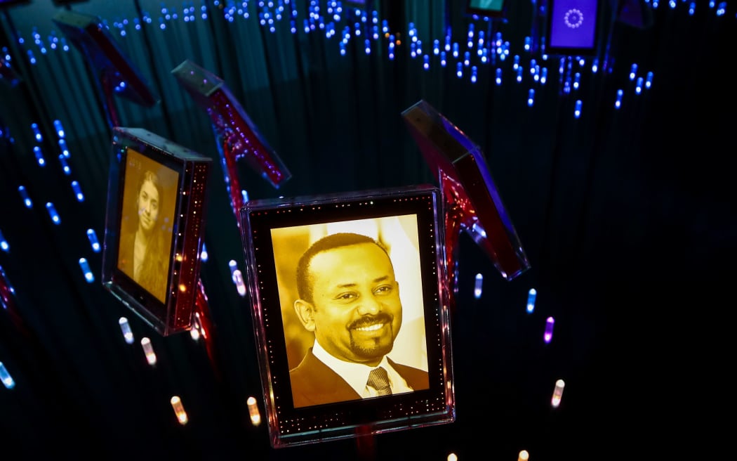 A picture of the 2019 Nobel Peace Prize laureate Ethiopian Prime Minister Abiy Ahmed Ali is on display at the Nobel Peace Center in Oslo on October 11, 2019.
