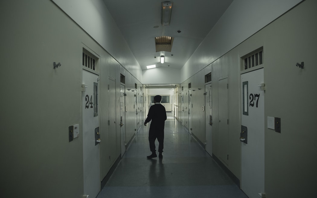 Lex dancing in the hallway outside his cell.