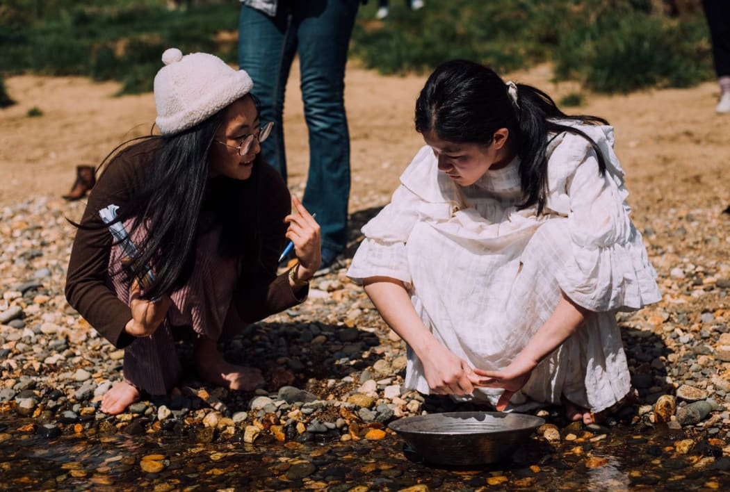Nahyeon Lee, left, on the set of her short film My Mother Told Me, with actor Bridget Wong.