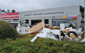 Business owner Mathew Coles says most of his furniture floated through the street.