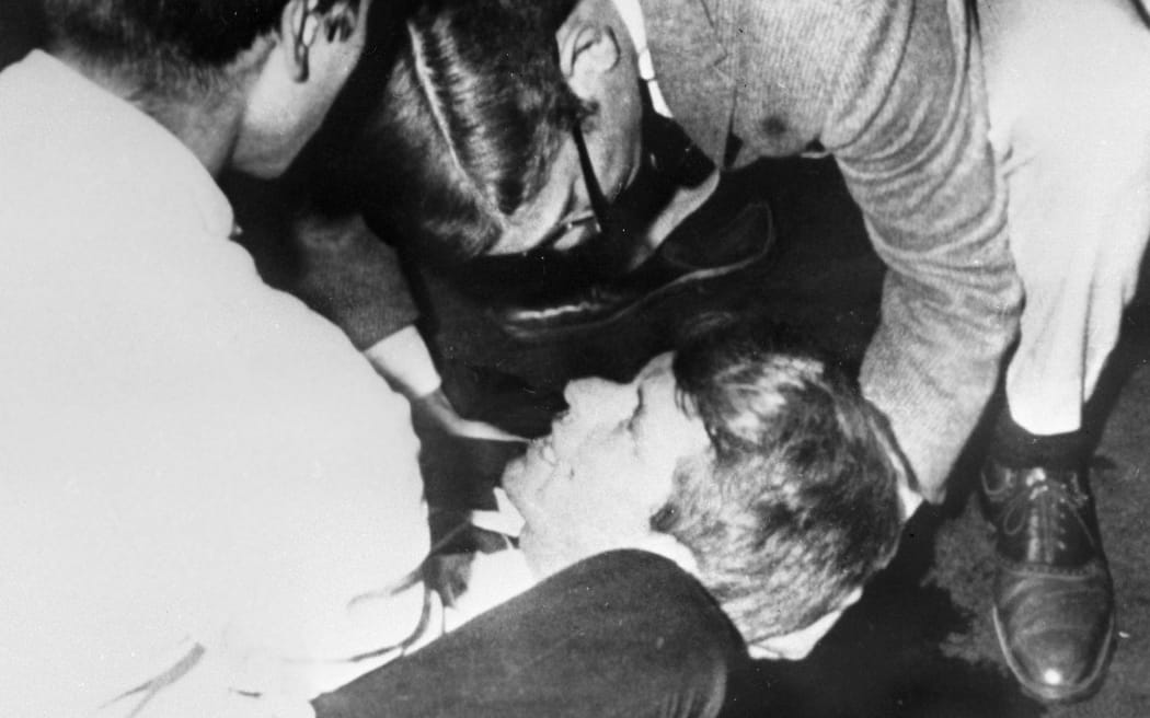 People aid Senator Robert Kennedy, who was mortally wounded by Sirhan Sirhan.
