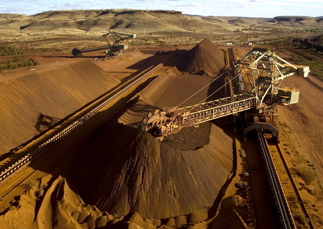 A Rio Tinto reclaimer working in the Yandicoogina stockyard in Western Australia's Pilbara region.