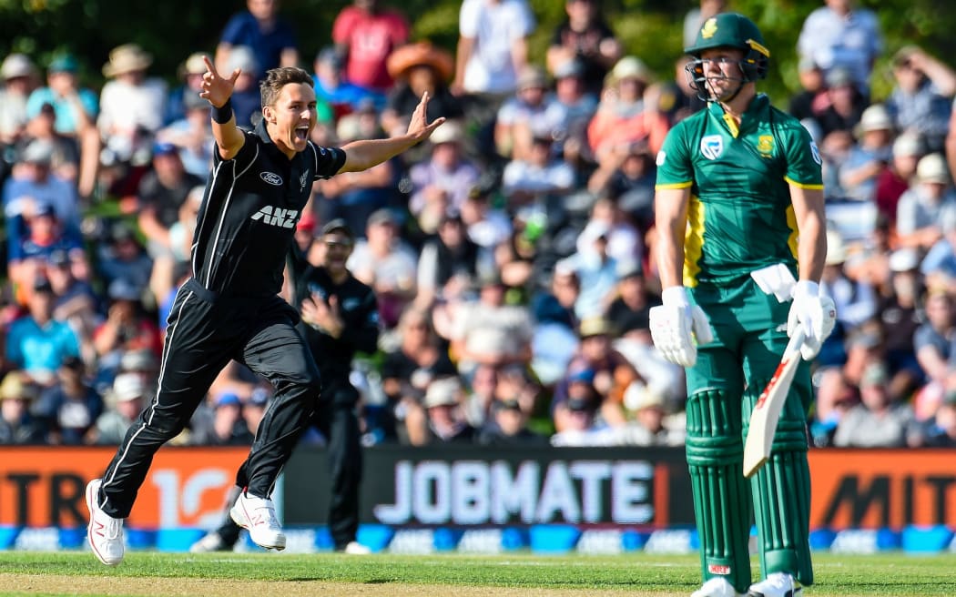 Trent Boult of the Black Caps gets the wicket of AB de Villiers of South Africa during the second One Day International Cricket match.