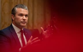Defence Secretary Pete Hegseth speaks in front of President Donald Trump during a cabinet meeting at the White House in Washington, DC on 2 December, 2025.
