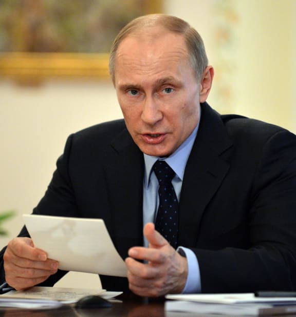 Vladimir Putin says Russia is acting in full compliance with international law.