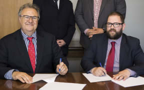 Salvation Army social housing manager Greg Coyle and Wellington City Council city housing manager John McDonald.