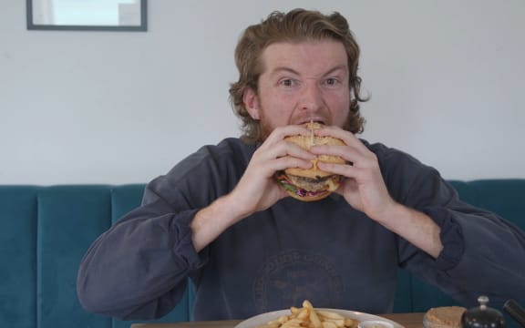 Reporter Harry Lock gets an advance tasting of a burger from the Botanist.