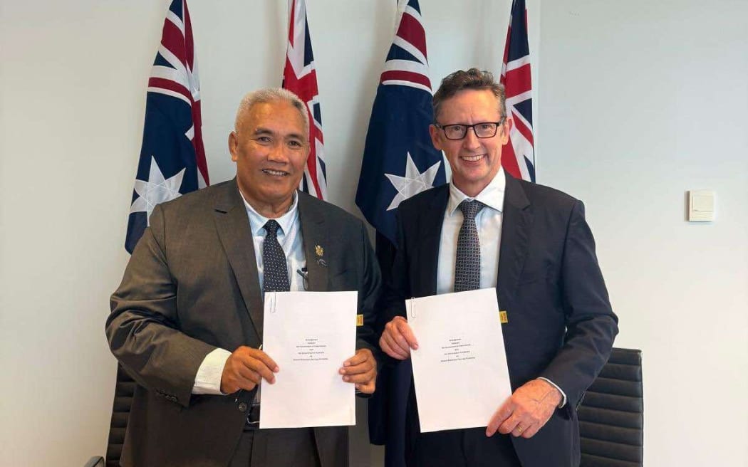 Minister for Foreign Affairs and Immigration Tingika Elikana was in Sydney this week to sign the agreement with Australia’s assistant minister Financial Services Stephen Jones. SUPPLIED / Australian High Commission, Cook Islands / 24111412