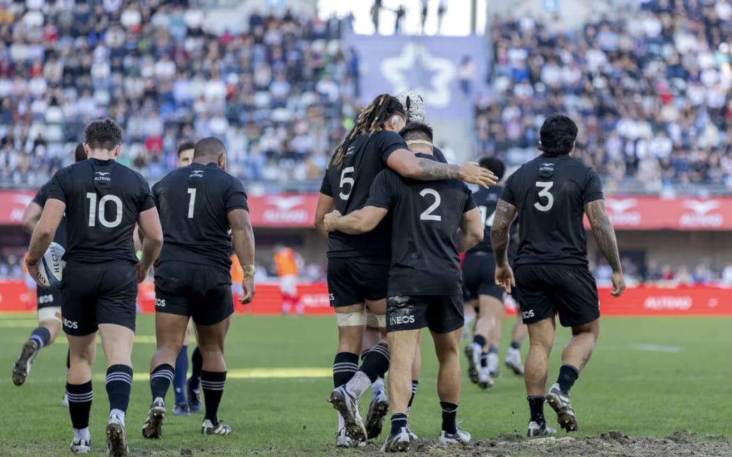 The All Blacks XV celebrate a try against Georgia.