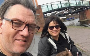 New Zealander Sam Coley works at Birmingham City University. He's pictured with wife Emilie and son Tom.