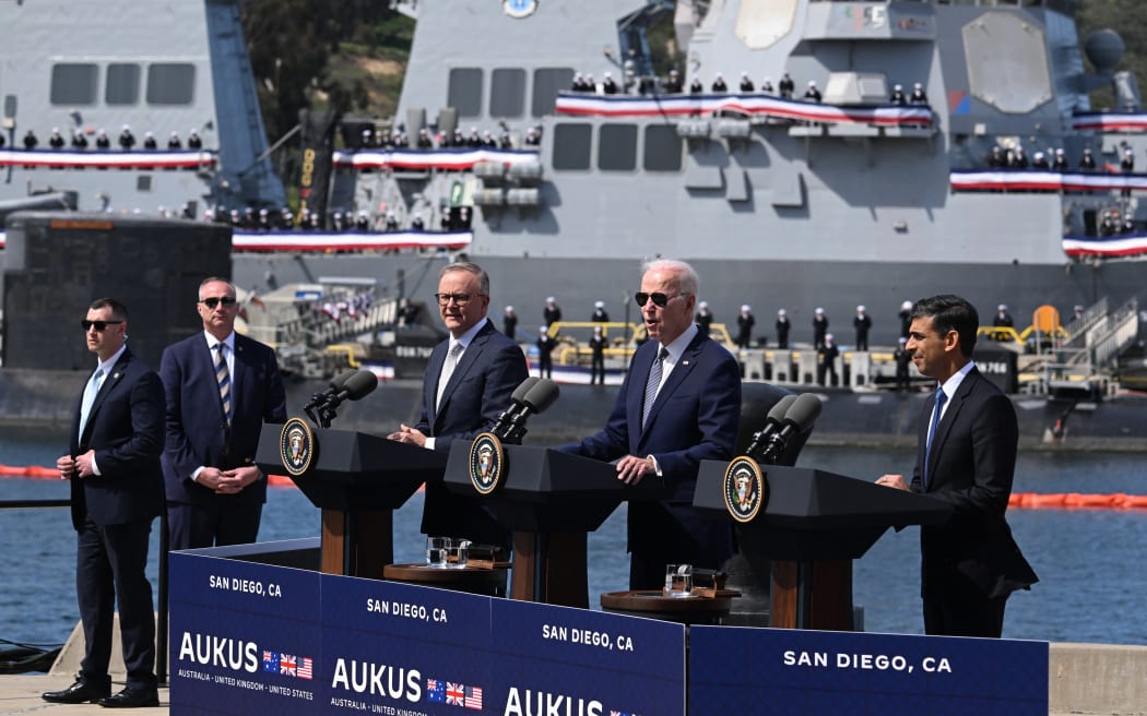 US President Joe Biden (centre) speaks alongside Australian Prime Minister Anthony Albanese (left) and British Prime Minister Rishi Sunak (right), during the AUKUS summit on 13 March, 2023, at Point Loma Naval Base in San Diego.