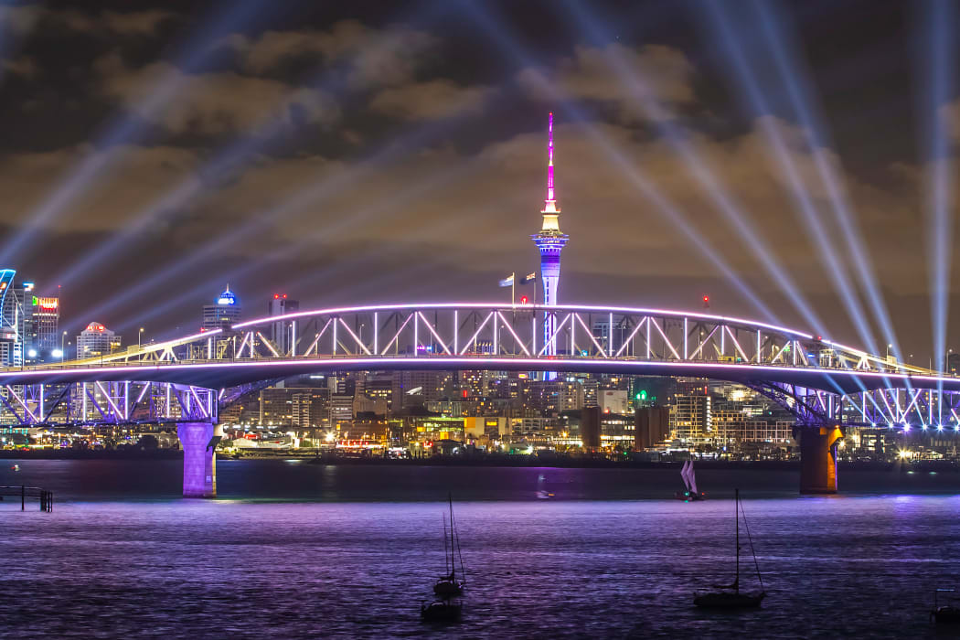 A light display replaced the traditional fireworks display from the Sky Tower in Auckland.