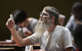 Nigel Richards competes in a category of the Francophone Scrabble World Championships in 2015.