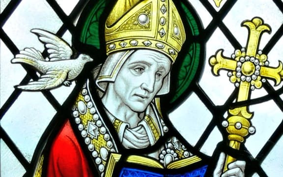 Stained glass window (1934) showing Saint David. Our Lady and Saint Non's chapel, St David's, Wales.