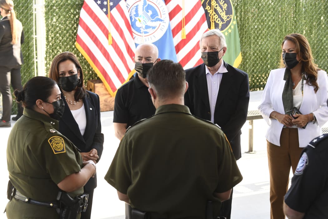 US Vice President Kamala Harris (second left) and other lawmakers touring the El Paso Border Patrol Station.
