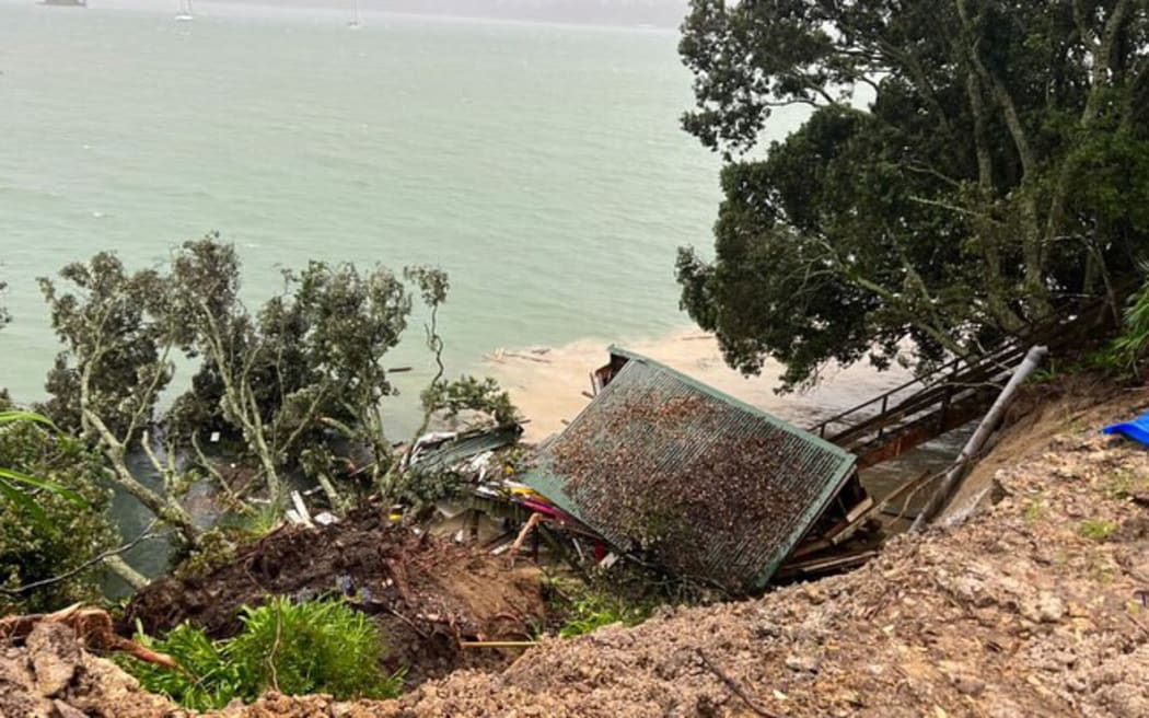 A boat shed appears to have been buried after a slip on Hamilton Road Beach at Herne Bay in Auckland.