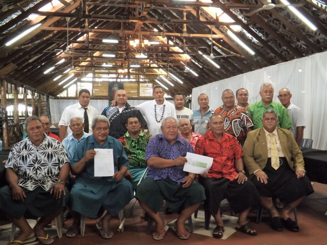 MP Laauli on right (front row) with several matais of Sasina village.
