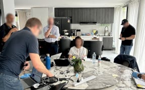 AFP officers executed a search warrant at the woman’s Rochedale home on 16 January, 2024, with officers seizing electronic devices and financial records.