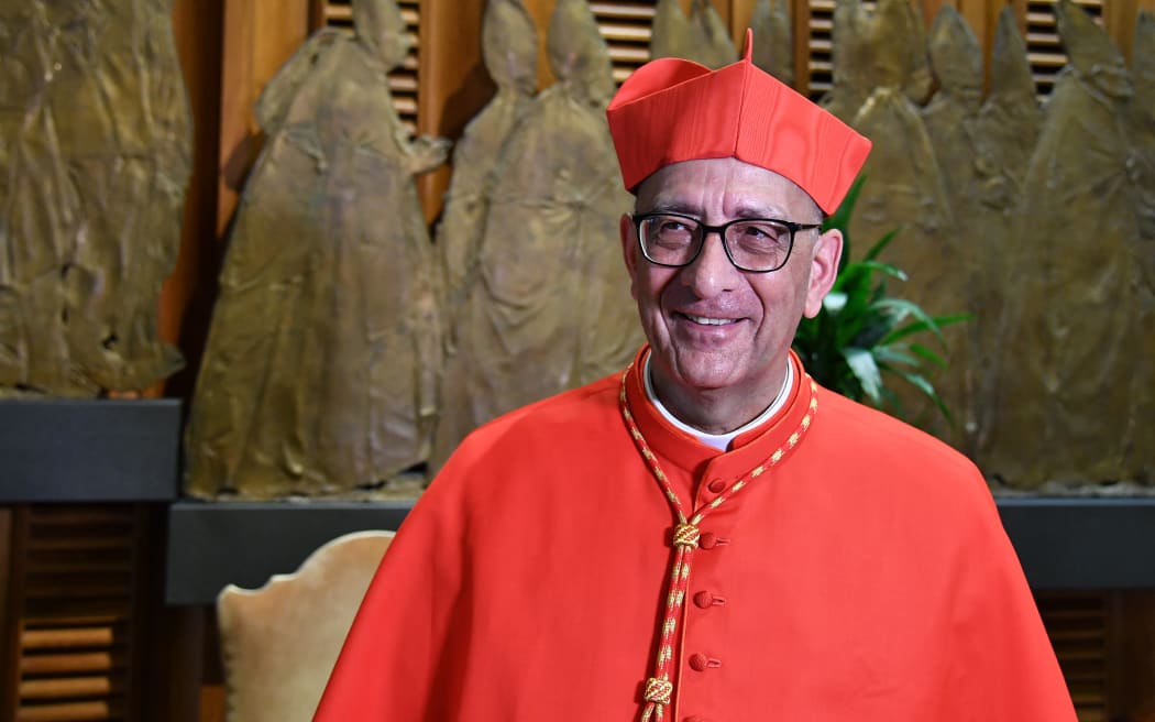 Newly elevated cardinal, Juan José Omella from Spain, attends the courtesy visit of relatives following a consistory for the creation of five new cardinals on June 28, 2017 at St Peter's basilica in Vatican. Four of the five new 'Princes of the Church' come from countries that have never had a cardinal before: El Salvador, Laos, Mali and Sweden. The fifth is from Spain. (Photo by Alberto PIZZOLI / AFP)