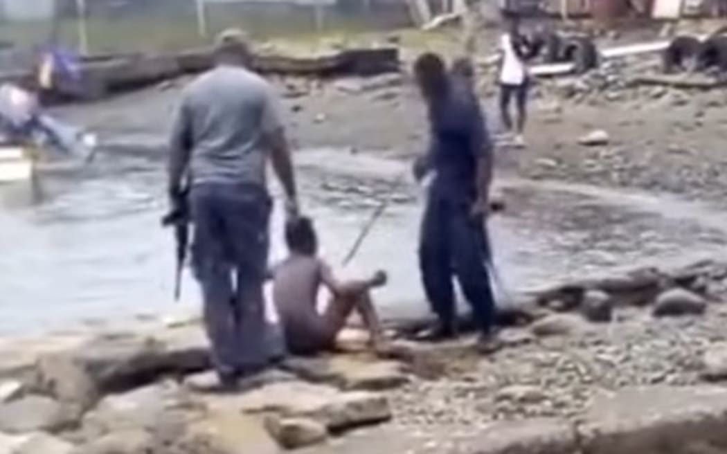 A screenshot of a torture video which went viral in PNG in August 2018.