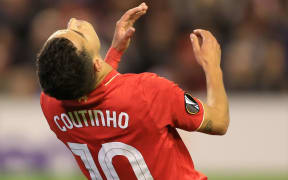 Liverpool's Philippe Coutinho celebrates scoring a goal.