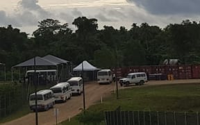 Buses taking people from the Manus detention centre to Lorengau