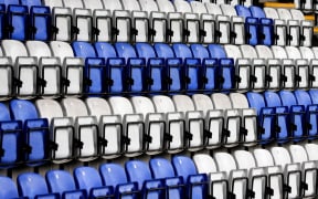 Empty stadium seats.

Generic