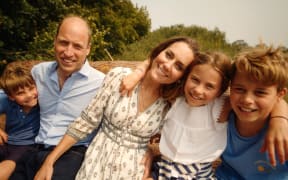 A handout still released by The Prince and Princess of Wales on September 9, 2024 and taken in Norfolk on an unspecified date last month shows Britain's Catherine, Princess of Wales, smiling with Britain's Prince William, Prince of Wales, and their children Britain's Prince George of Wales, Britain's Princess Charlotte of Wales and Britain's Prince Louis of Wales. Catherine announced that she had completed her course of chemotherapy following a shock cancer diagnosis earlier this year.