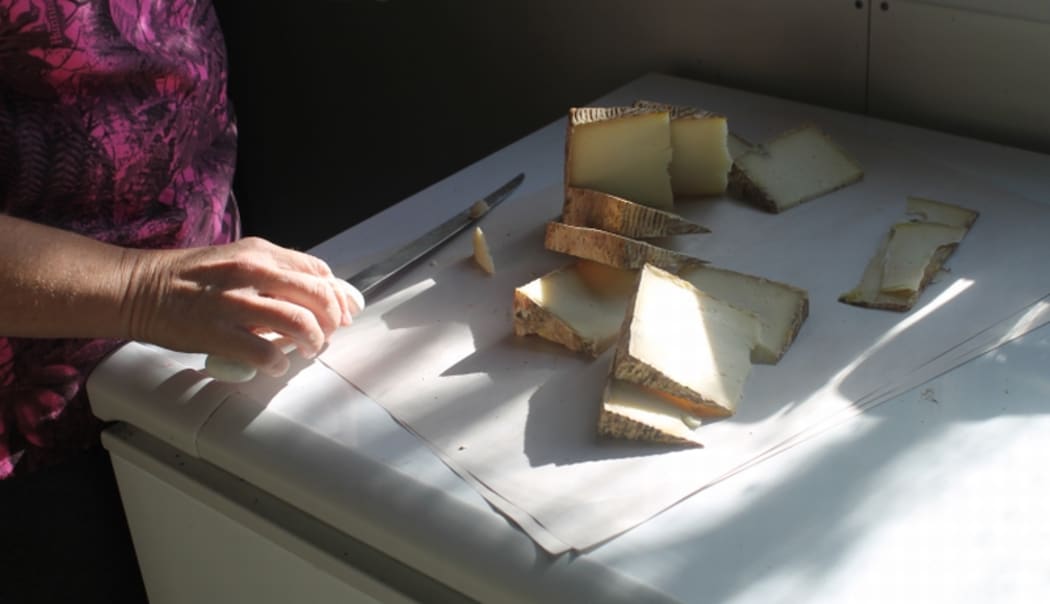An image of sliced Pecorino-style cheese made from buffalo milk.