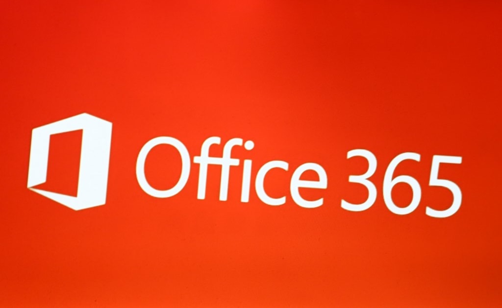 The logo of Microsoft Office 365 is seen on a screen. (Photo by Alexander Pohl/NurPhoto)