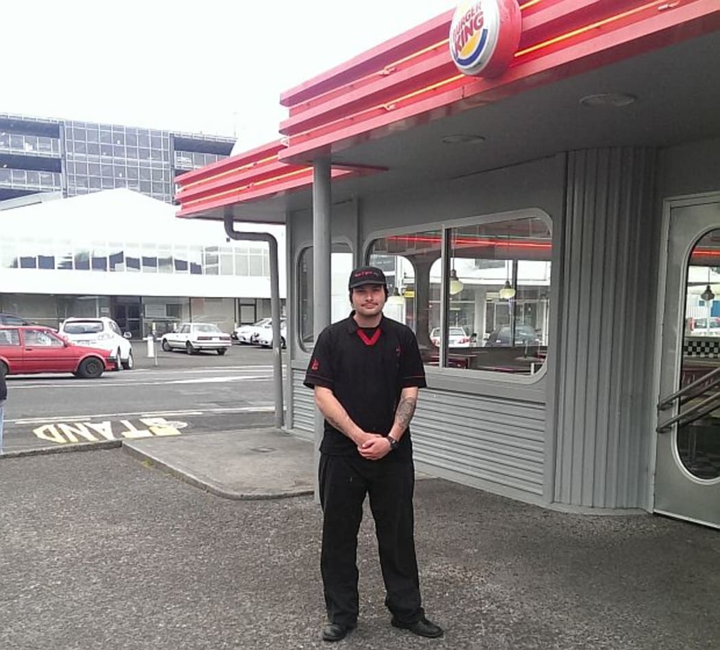 Hamilton Burger King worker, Brett Patterson, stands outside the store.