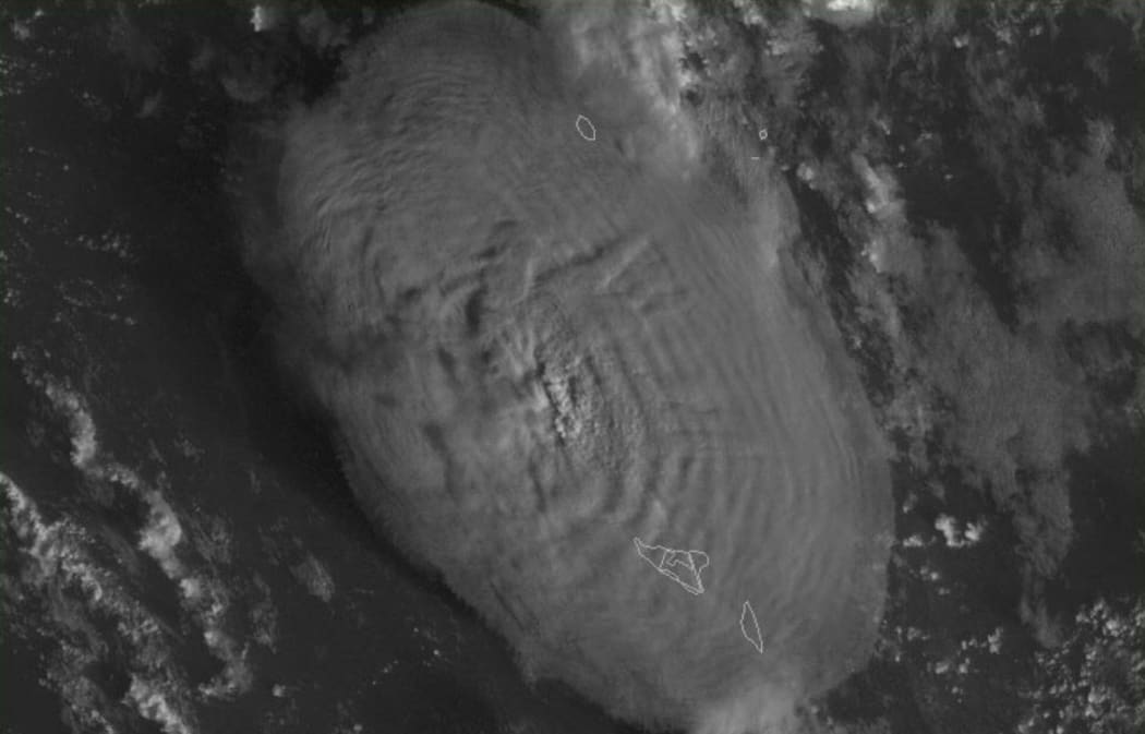 A screen grab taken from the NOAA GOES-West satellite on 15 January 2022 shows the volcanic eruption that provoked a tsunami in Tonga.