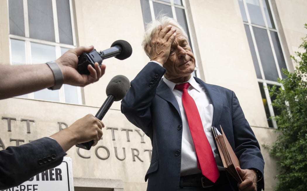 WASHINGTON, DC - JUNE 3: Former Trump White House Advisor Peter Navarro talks to the media as he leaves federal court on June 3, 2022 in Washington, DC. A federal grand jury indicted former Trump White House adviser Peter Navarro for contempt of Congress after refusing to cooperate with the House January 6 Committees investigation.   Drew Angerer/Getty Images/AFP (Photo by Drew Angerer / GETTY IMAGES NORTH AMERICA / Getty Images via AFP)