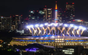 Fireworks explode over the Olympic Stadium during the closing ceremony of the Tokyo 2020 Olympic Games in Tokyo, Japan.