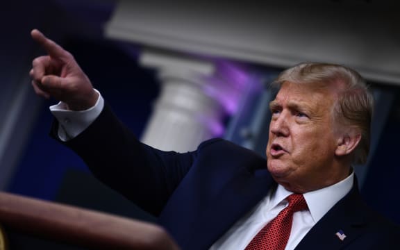 US President Donald Trump speaks to the press in the Brady Briefing Room of the White House in Washington, DC, on August 10, 2020.