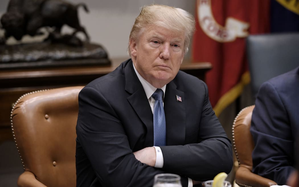 US President Donald Trump attends a working lunch with governors in the Roosevelt Room of the White House, in Washington, DC, June 21, 2018.