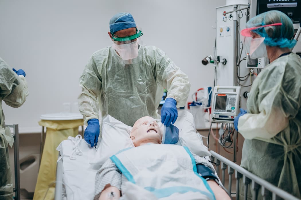 Health workers take part in ICU training for Covid-19 at Hutt Hospital.