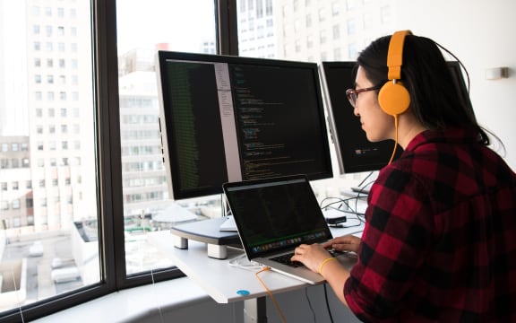 woman on desktop computer