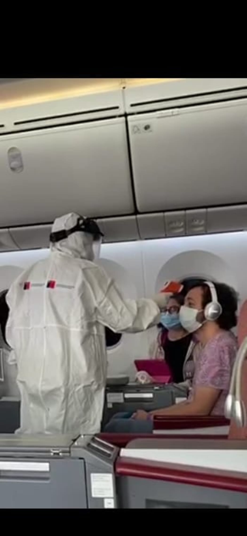 Rapa Nui bound passengers being tested for Covid-19 symptoms.