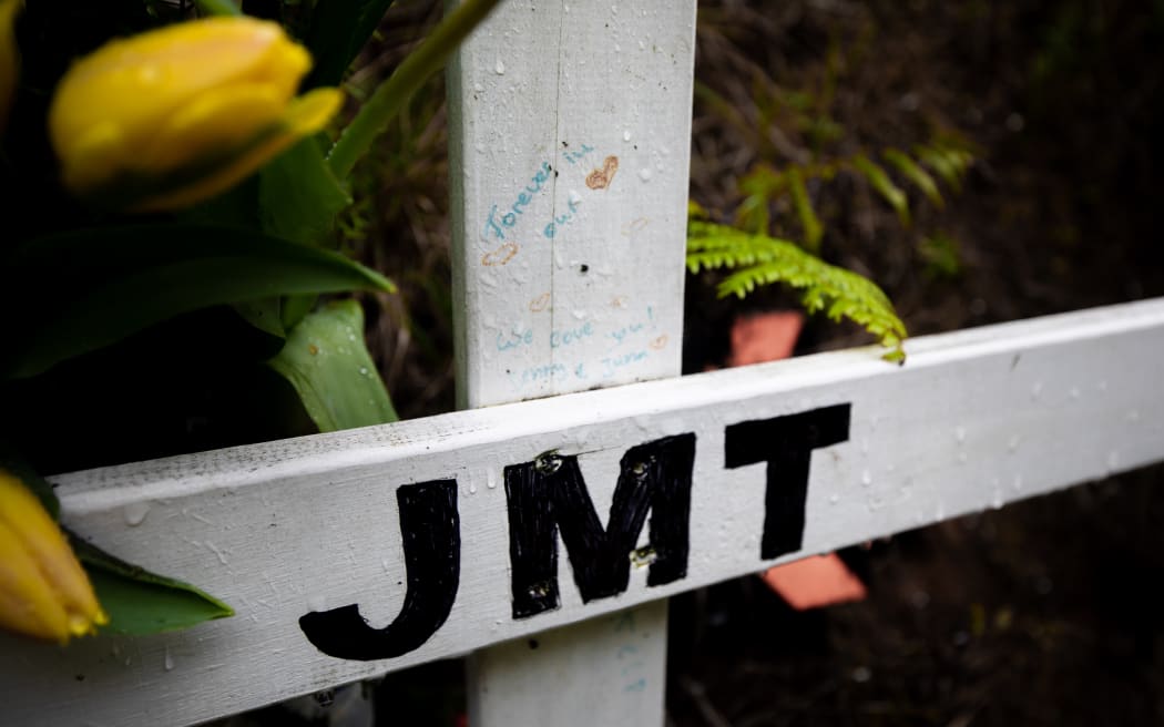 A handwritten message on the memorial for Jerrim Toms reads "Forever in our hearts. Love Jenny and Juna." Juna is Jerrim's daughter. She was born 12 days after police killed her father.