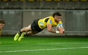 TJ Perenara of the Hurricanes  scores a try during Super Rugby Pacific - Hurricanes v Chiefs at Sky Stadium, Wellington, New Zealand on Saturday 13 April 2024. © Mandatory credit: Elias Rodriguez / www.photosport.nz