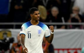 England's forward #11 Marcus Rashford celebrates after scoring his team's third goal during the Qatar 2022 World Cup Group B football match between Wales and England at the Ahmad Bin Ali Stadium in Al-Rayyan, west of Doha on 29 November, 2022.