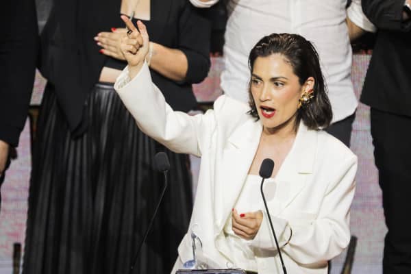 Anna Coddington accepts the 2024 Silver Scroll award.