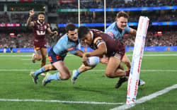 MELBOURNE, AUSTRALIA - JUNE 17: Selwyn Cobbo of the Maroons scores a try during game two of the Men’s State of Origin series between New South Wales Blues and Queensland Maroons at Melbourne Cricket Ground on June 17, 2026 in Melbourne, Australia. (Photo by Quinn Rooney/Getty Images)