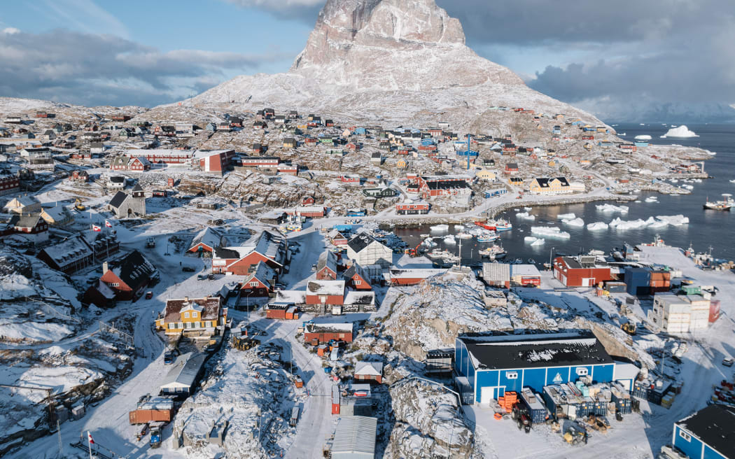 Uummannaq Mountain towers above a town of the same name and its iceberg-filled fjord in Greenland, another destination on the list. Photo: Ciril Jazbec