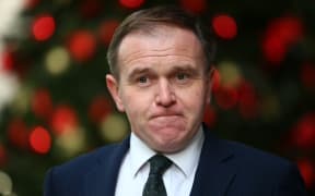 Britain's Environment Secretary George Eustice leaves Broadcasting House after making an appearance on the BBC political programme The Andrew Marr Show in London.